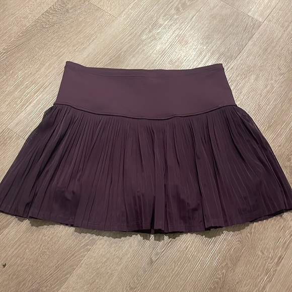 Athleta Dresses & Skirts - ATHLETA PURPLE TENNIS SKIRT